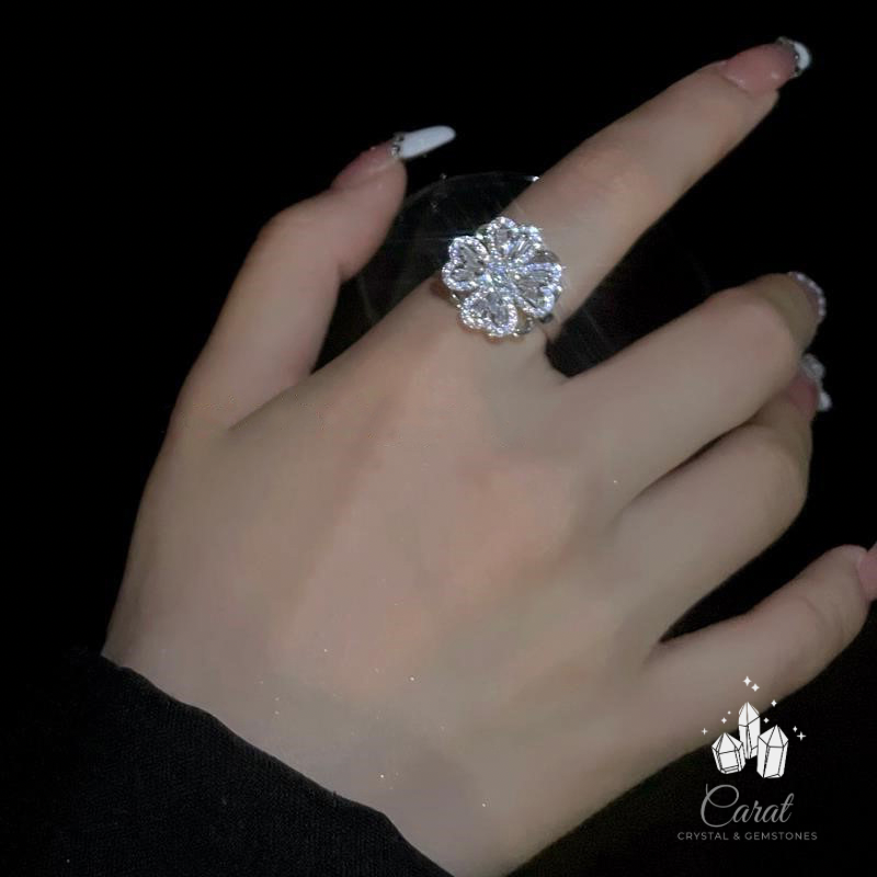 Close-up view of a Spinnable Clover Ring with a rotating clover motif, adorned with sparkling diamonds